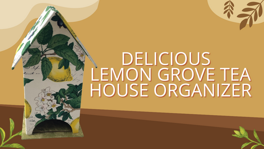 Fabric-covered tea house organizer with a lemon and floral print, set against a warm, stylized background with the text "Delicious Lemon Grove Tea House Organizer.